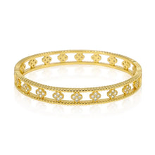 Load image into Gallery viewer, Gold bangle bracelet with floral designs.
